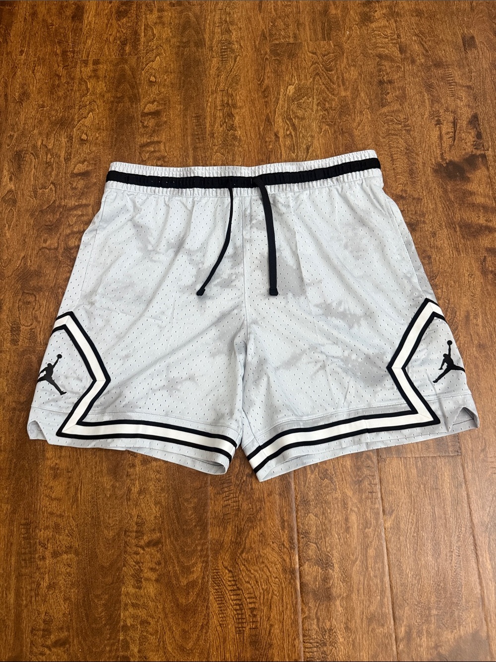Jordan Men's Light Gray Basketball Shorts with Black Accents